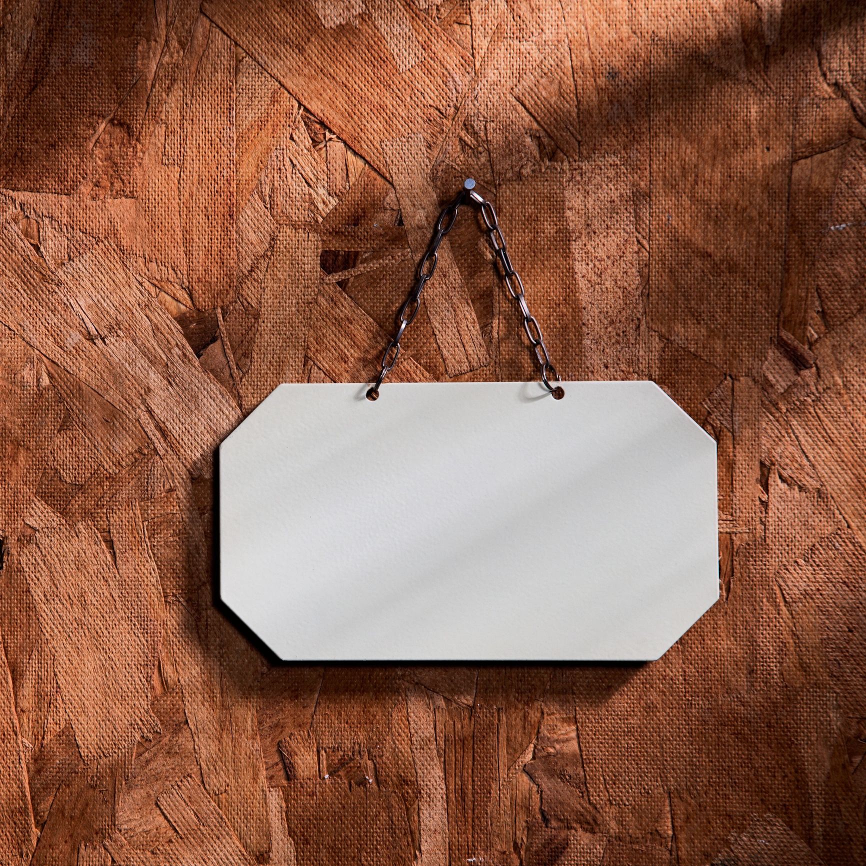 Signage detail on wood background